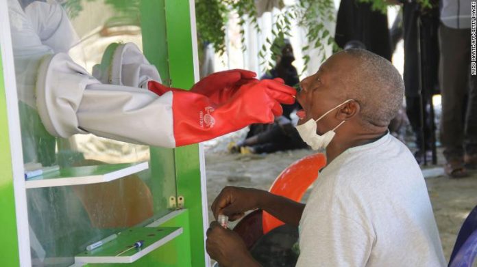 world 3 A patient takes a coronavirus test at a hospital in Nigeria. AFP/GETTY IMAGES