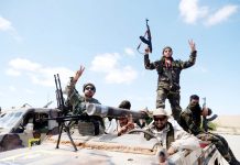 Libyan National Army members head out of Benghazi to reinforce troops advancing towards Tripoli, in Benghazi, Libya. Esam Omran Al-Fetori. Reuters