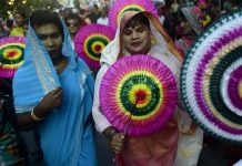 Bangladeshi hijras – transgenders – march in the street during a rally to mark the first ever nationwide program to observe ‘Hijra Day’ in Dhaka, Bangladesh. MUNIR UZ ZAMAN/AFP
