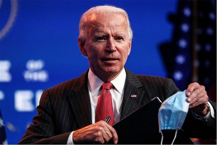 US President-elect Joe Biden concludes his remarks to reporters following an online meeting with members of the National Governors Association executive committee in Wilmington, Delaware, United States. TOM BRENNER/REUTERS US President-elect Joe Biden concludes his remarks to reporters following an online meeting with members of the National Governors Association executive committee in Wilmington, Delaware, United States. TOM BRENNER/REUTERS