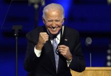 Trump faces calls to work with Biden team on transition President-elect Joe Biden gestures to supporters Saturday, Nov. 7, 2020, in Wilmington, Delaware, United States. ANDREW HARNIK/AP PHOTO