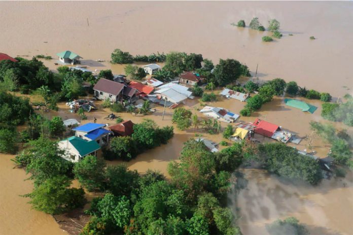 nation Houses are submerged in flooded areas in the Cagayan Valley region on Saturday, Nov. 14, 2020. Even if there were no typhoon signals hoisted over the region, numerous factors led to the worst flooding the province has seen in decades, according to Cagayan Gov. Manuel Mamba. PHILIPPINE COAST GUARD VIA AP