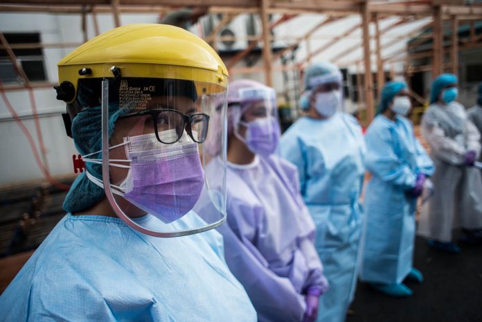 Mass Testing According to Labor Secretary Silvestre Bello III, those covered by the lifting of the deployment ban are nurses, medical workers, doctors, dentists, among others. PHOTO BY LISA MARIE DAVID/RAPPLER