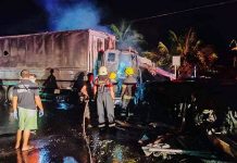 Two vans collide, catch fire; 4 dead Fire fighters and emergency responders make sure the blaze is completely put out from this fire-stricken van in Purok Katilingban, Barangay Sagwa Banwa, Valladolid, Negros Occidental on Monday. MARK CABRILLO