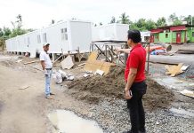 Gov. Esteban Evan Contreras of Capiz inspects the quarantine facility being constructed for the personnel of its containerized test laboratory for coronavirus disease. PHOTO FROM CAPIZ KABALAKA INFORMATION CENTER