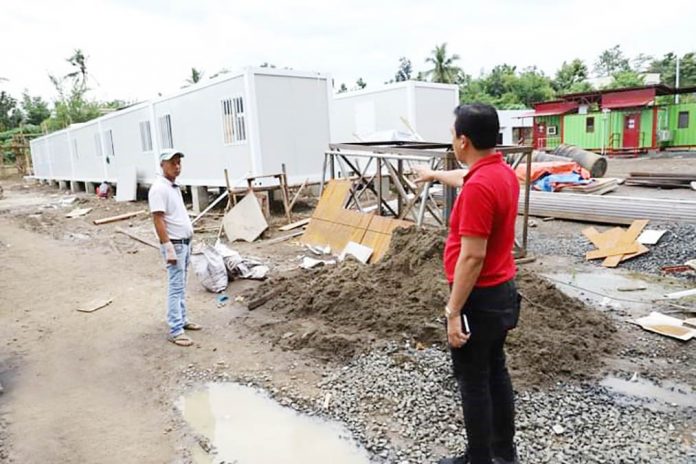 Gov. Esteban Evan Contreras of Capiz inspects the quarantine facility being constructed for the personnel of its containerized test laboratory for coronavirus disease. PHOTO FROM CAPIZ KABALAKA INFORMATION CENTER