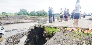 Antique Provincial Disaster Risk Reduction and Management Office head Broderick Train checks the dike in Barangay Camncijan, Culasi, Antique on Nov. 2, 2020. PDRRMO ANTIQUE