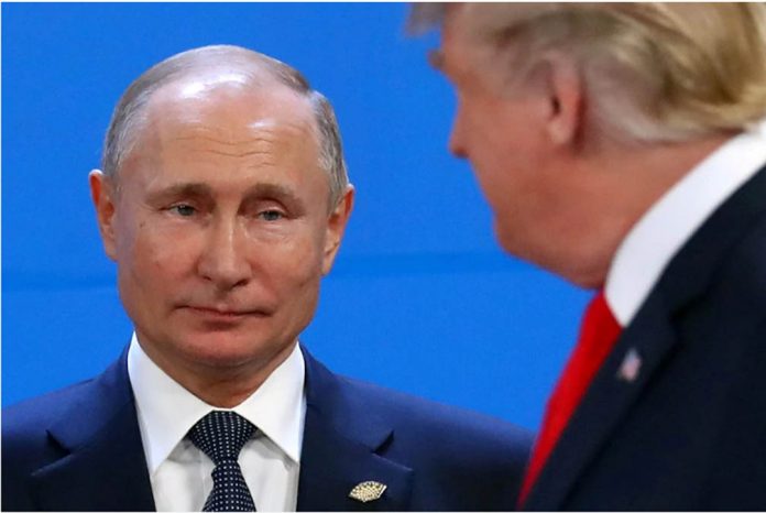 russia Russia’s Vladimir Putin and US President Donald Trump are seen during the G20 summit in Buenos Aires, Argentina. MARCOS BRINDICCI/REUTERS