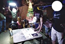 3 arrested for ‘shabu’ Mary Grace Lopez, 26; Rommel Aropio, 39; and Tyron Bellosillo, 30, sit handcuffed while antidrug operatives conduct an inventory of shabu seized in an entrapment in Barangay 1, Bacolod City on Dec. 30. BCPO