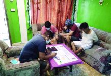 3 drug suspects fall in buy-bust An antidrug operative conducts an inventory of suspected illegal drugs seized from three suspects in a buy-bust operation in Barangay 16, Bacolod City on Dec. 17. BCPO
