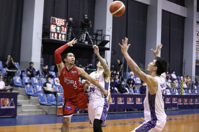 Barangay Ginebra San Miguel Kings’ LA Tenorio throws the ball after being bumped by TNT Tropang Giga’s David Semerad in Game 4 of their 2020 PBA Philippine Cup finals last Sunday. PBA PHOTO Barangay Ginebra San Miguel Kings’ LA Tenorio throws the ball after being bumped by TNT Tropang Giga’s David Semerad in Game 4 of their 2020 PBA Philippine Cup finals last Sunday. PBA PHOTO