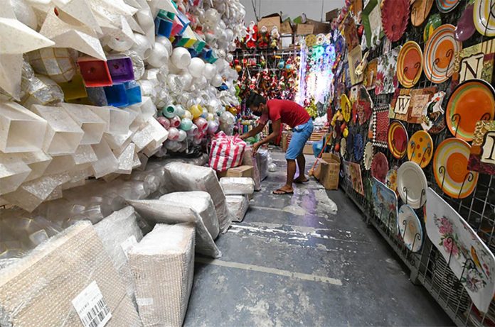 biz banner A stall in Quezon City utilizes various online platforms to sell Christmas decors at the start of the country’s ‘ber’ months. MARK DEMAYO/ABS-CBN NEWS