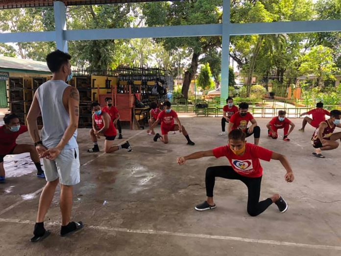 Wearing facemasks, these performers joining the Dinagyang Festival 2021 practice inside a school gym in Iloilo City. Performers began their practice mid-November. They are mandated to observe health protocols to avert spreading the coronavirus disease 2019. ILONGGO ARTISTS FESTIVAL ASSOCIATION DANCING IN THE NEW NORMAL. Wearing facemasks, these performers joining the Dinagyang Festival 2021 practice inside a school gym in Iloilo City. Performers began their practice mid-November. They are mandated to observe health protocols to avert spreading the coronavirus disease 2019. ILONGGO ARTISTS FESTIVAL ASSOCIATION DANCING IN THE NEW NORMAL.