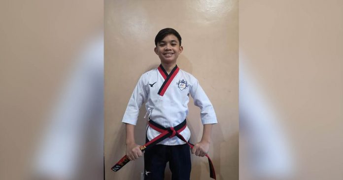 ilonggo jin Cyd Edryc Esmaña nets two gold medals in the cadet male division blackbelt category of freestyle kicking and kickpad kicking. CONTRIBUTED PHOTO