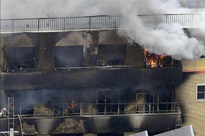 An aerial view shows smoke and flame rise from the three-story Kyoto Animation building which was torched in Kyoto, western Japan, in this photo taken on July 18, 2019. KYODO VIA REUTERS An aerial view shows smoke and flame rise from the three-story Kyoto Animation building which was torched in Kyoto, western Japan, in this photo taken on July 18, 2019. KYODO VIA REUTERS