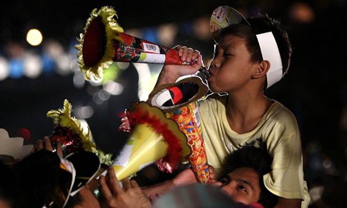 naiton To prevent the spread of COVID-19, the Department of Health is urging the public to refrain from using party horns and whistles in welcoming the new year. PHOTO COURTESY OF RITCHIE B. TONGO/EPA