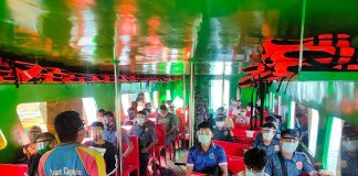 Inside this Boracay Island-bound boat, passengers wear facemasks and face shields to prevent the spread of coronavirus disease 2019. PHILIPPINE COAST GUARD-AKLAN PHOTO