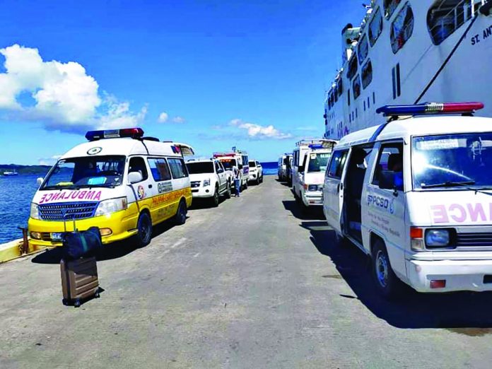 Following the surge in new coronavirus disease cases in Barangay Poblacion, Kalibo, Aklan, the local government unit is limit the number of residents returning home from other areas this holiday season. Photo shows ambulances ready to fetch returning locally stranded individuals and overseas Filipino workers. Following the surge in new coronavirus disease cases in Barangay Poblacion, Kalibo, Aklan, the local government unit is limit the number of residents returning home from other areas this holiday season. Photo shows ambulances ready to fetch returning locally stranded individuals and overseas Filipino workers.