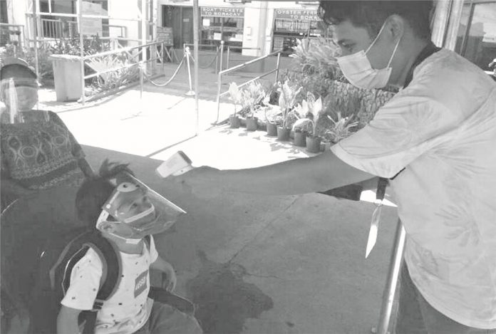 Tourists entering Boracay Island are subjected to body temperature check and baggage inspection. Soon, they will also be made to pay a higher environmental fee – P300 for foreigners and P150 for domestic non-Aklanon visitors. PN Photo Tourists entering Boracay Island are subjected to body temperature check and baggage inspection. Soon, they will also be made to pay a higher environmental fee – P300 for foreigners and P150 for domestic non-Aklanon visitors. PN Photo
