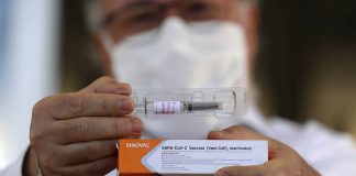 The coronavirus vaccine candidate from China’s Sinovac Biotech remains the Philippines’ first choice despite bribery allegations, according to Palace spokesperson Harry Roque. ERALDO PERES/AP PHOTO