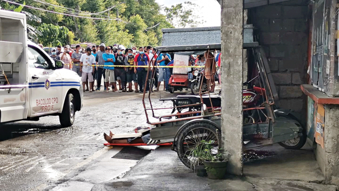 Authorities cordon this area in Barangay Pahanocoy, Bacolod City where tricycle driver Noel Peraren was shot dead by motorcycle-riding assassins early morning yesterday. BCPO Authorities cordon this area in Barangay Pahanocoy, Bacolod City where tricycle driver Noel Peraren was shot dead by motorcycle-riding assassins early morning yesterday. BCPO