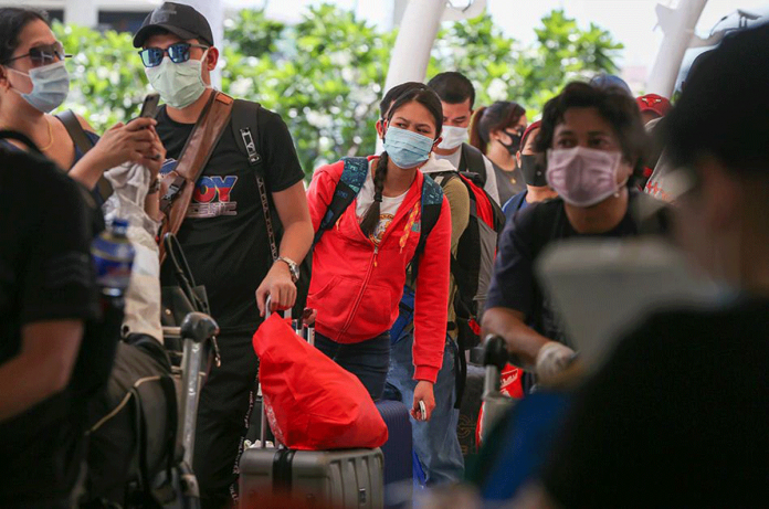Returning Overseas Filipino Workers (OFW) wait in line at the Ninoy Aquino International Airport (NAIA) Terminal 2 in Pasay City on May 25, 2020. JONATHAN CELLONA/ABS-CBN NEWS Returning Overseas Filipino Workers (OFW) wait in line at the Ninoy Aquino International Airport (NAIA) Terminal 2 in Pasay City on May 25, 2020. JONATHAN CELLONA/ABS-CBN NEWS