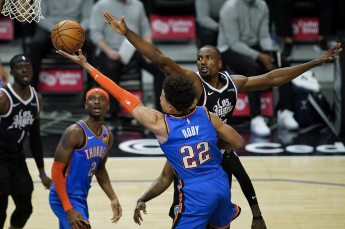 clippers Oklahoma City Thunder forward Isaiah Roby takes a shot against center Serge Ibaka during the third quarter of an NBA basketball game on Jan. 24 in Los Angeles, California, United States. AP PHOTO