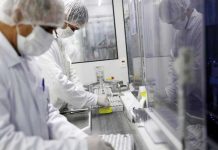 Brazil researchers: China’s CoronaVac has 50.4% efficacy Employees handle vials containing CoronaVac, Sinovac Biotech’s coronavirus vaccine, in the bottle filling section at Butantan biomedical production center in Sao Paulo, Brazil on Jan. 12, 2021. AMANDA PEROBELLI/REUTERS