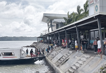People from Guimaras disembark from this motorboat at the Iloilo Ferry Terminal-Parola in Iloilo City. Note the many people waiting at the terminal; they will be boarding the motorboat which would leave after 15 minutes back to Guimaras. IAN PAUL CORDERO/ PN