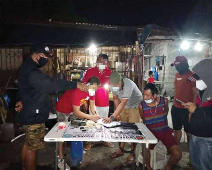 BUSTED Antonio Romero (sits, handcuffed) is the No. 1 in the target list of the Philippine Drug Enforcement Agency (PDEA) Region 6. He yielded suspected shabu weighing about valued at around P800,000 in an entrapment operation in Barangay Tanza Timawa, Iloilo City on Jan. 12. BUSTED Antonio Romero (sits, handcuffed) is the No. 1 in the target list of the Philippine Drug Enforcement Agency (PDEA) Region 6. He yielded suspected shabu weighing about valued at around P800,000 in an entrapment operation in Barangay Tanza Timawa, Iloilo City on Jan. 12.