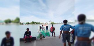 The crew of this Guimaras-bound modernized motorboat docked at the Iloilo Ferry Terminal-Parola in Iloilo City wait for passengers. IAN PAUL CORDERO/PN