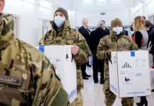 Hungary first in EU to OK Russian vaccine Hungarian soldiers have been helping deliver the Pfizer-BioNTech vaccine. REUTERS