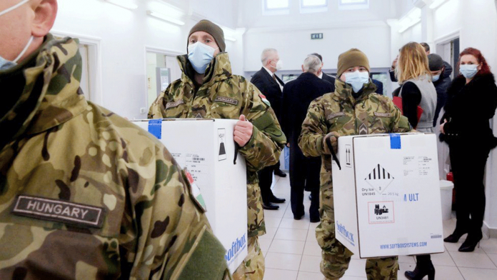 Hungarian soldiers have been helping deliver the Pfizer-BioNTech vaccine. REUTERS
