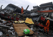 Indonesia quake death toll now over 80 Search and rescue personnel inspect a collapsed building following an earthquake in Mamuju, West Sulawesi province in Indonesia on Jan. 16, 2021. ANTARA FOTO/SIGID KURNIAWAN VIA REUTERS