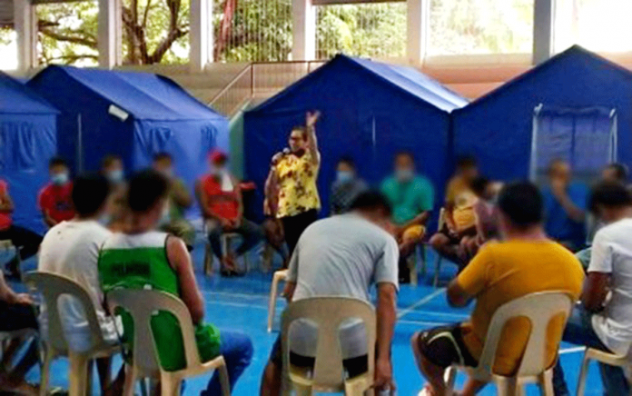 Clients enrolled at the Balay Silangan reformation center in Nueva Valencia, Guimaras perform group dynamic activities on Jan. 22, 2021. PDEA-6 VIA PNA GROUP DYNAMICS