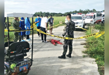 Drinking spree leads to fatal stabbing Policemen and emergency responders inspect the lifeless body of Dominique Gumban in Barangay Barangay Pagsanga-an, Pavia, Iloilo yesterday morning. IAN PAUL CORDERO/PN