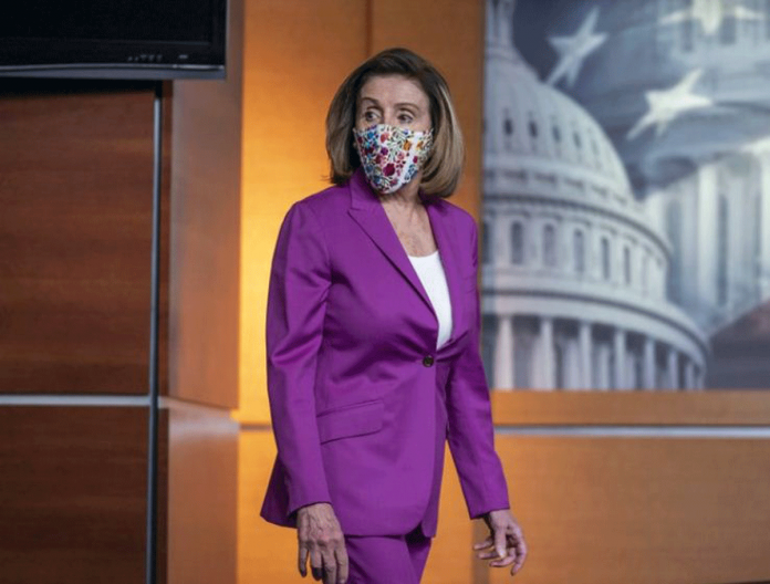 Speaker of the House Nancy Pelosi, D-Calif., holds a news conference on the day after violent protesters loyal to President Donald Trump stormed the US Congress, at the Capitol in Washington on Jan. 7, 2021. J. SCOTT APPLEWHITE/AP PHOTO Speaker of the House Nancy Pelosi, D-Calif., holds a news conference on the day after violent protesters loyal to President Donald Trump stormed the US Congress, at the Capitol in Washington on Jan. 7, 2021. J. SCOTT APPLEWHITE/AP PHOTO