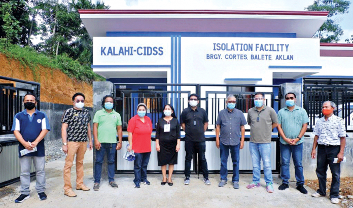 Officials of the Department of Social Welfare and Development Region 6 and the municipality of Balete, Aklan stand in front of a newly-inaugurated quarantine facility of the town. PHOTO DSWD 6 Officials of the Department of Social Welfare and Development Region 6 and the municipality of Balete, Aklan stand in front of a newly-inaugurated quarantine facility of the town. PHOTO DSWD 6