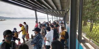 Guimaras-bound people wait at the Iloilo Ferry Terminal-Parola in Iloilo City for motorboats would that take them across the Iloilo Strait to the island province nearby. IAN PAUL CORDERO/PN