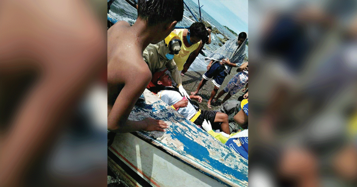 sebasteFisherman Fisherman Bernie Francisco of Sebaste, Antique finally gets to rest on the shore of San Jose, Antique after being rescued by fellow fishermen. When his boat capsized, he was stuck in the sea for four days without food and water, and exposed to the elements.