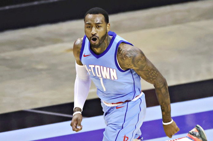 Houston Rockets' John Wall reacts during the second quarter against the Washington Wizards in an NBA basketball game Tuesday, Jan. 26, 2021, in Houston. CARMEN MANDATO/POOL PHOTO VIA AP Houston Rockets' John Wall reacts during the second quarter against the Washington Wizards in an NBA basketball game Tuesday, Jan. 26, 2021, in Houston. CARMEN MANDATO/POOL PHOTO VIA AP