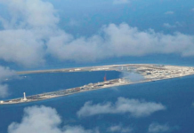 China to conduct military drills in South China Sea amid tensions with US An aerial view of China occupied Subi Reef at Spratly Islands in disputed South China Sea. REUTERS/Francis Malasig/Pool