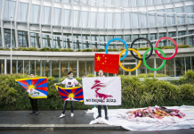 Human rights groups call for Winter Olympics boycott Protesters carry Tibetan flags during a protest against Beijing 2022 Winter Olympics because of reported human rights abuse. AP