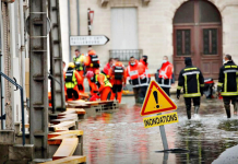 Heavy floods hit France, Paris area on flood alert Rescue workers help residents in flooded areas as the Charente River overflows after days of rainy weather causing flood in western France, on Feb. 8, 2021. REUTERS