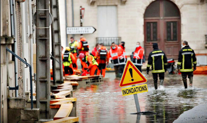 Heavy-floods-hit-France Rescue workers help residents in flooded areas as the Charente River overflows after days of rainy weather causing flood in western France, on Feb. 8, 2021. REUTERS