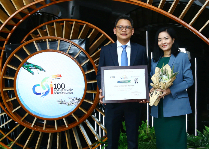 URC Universal Robina Corporation's Vietnam arm was recognized as one of Vietnam's top sustainable businesses in 2020. Receiving the award are (from left) finance officer, Alvin Geronimo, and head of legal and corporate affairs, Luong Thi Phuoc Lan.