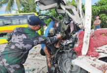 Freak truck-bus crash kills brgy ‘kagawad’ FREAK ACCIDENT. This policeman checks the body of Johnny Delariarte pinned by the wreckage of his truck that crashed against a Ceres bus in Barangay Cabilauan, Barotac Nuevo, Iloilo yesterday. BAROTAC NUEVO POLICE STATION