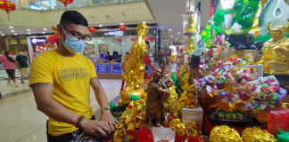 Feng Shui stall vendor Melvin Aranda says people patronize good luck items believing they will bring prosperity and fortune. GLENDA TAYONA/PN