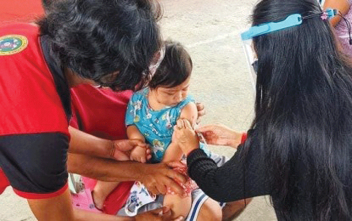 news-bacolod IMMUNIZATION A baby in Bacolod City gets immunized for measles-rubella as part of the Department of Health’s “Chikiting Ligtas” supplemental immunization activity. BACOLOD CITY PIO