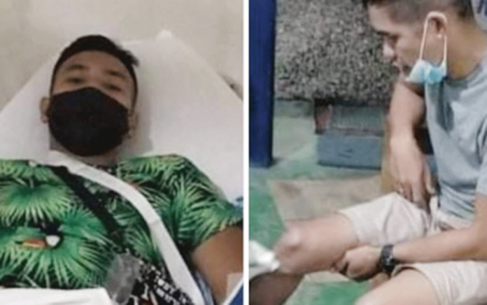 news-mae-cops_c Police Lieutenant Roque Gimeno III (right) and Police Patrolman Jhon Ray Ortega are recovering from gunshot wounds sustained during a shootout with a fugitive in Barangay Singcang-Airport, Bacolod City on Feb. 11. BCPO